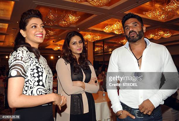 Indian Bollywood actors Kajal Aggarwal, Huma Qureshi and Suniel Shetty attend the launch for the fifth Celebrity Cricket League in Mumbai on November...