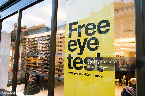shop front - optometry sign stock pictures, royalty-free photos & images