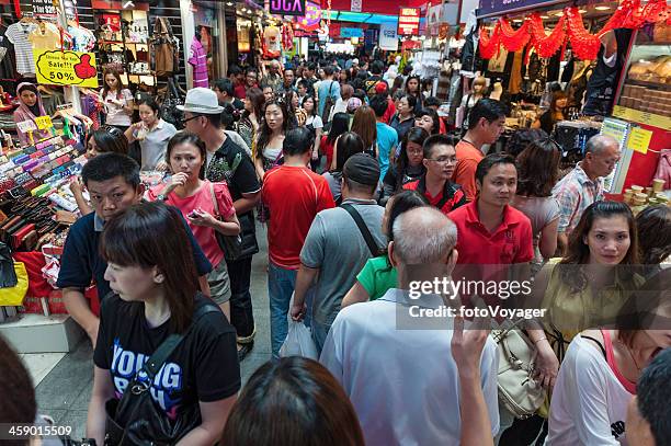 singapore crowds in bugis street market - singapore alley stock pictures, royalty-free photos & images