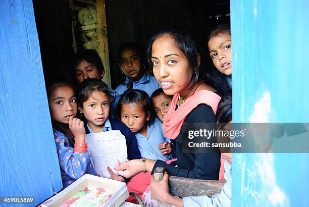 educating nepalese - nepal children stock pictures, royalty-free photos & images