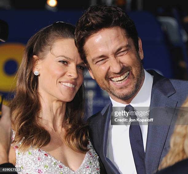 Actress Hilary Swank and actor Gerard Butler arrive at the 18th Annual Hollywood Film Awards at Hollywood Palladium on November 14, 2014 in...