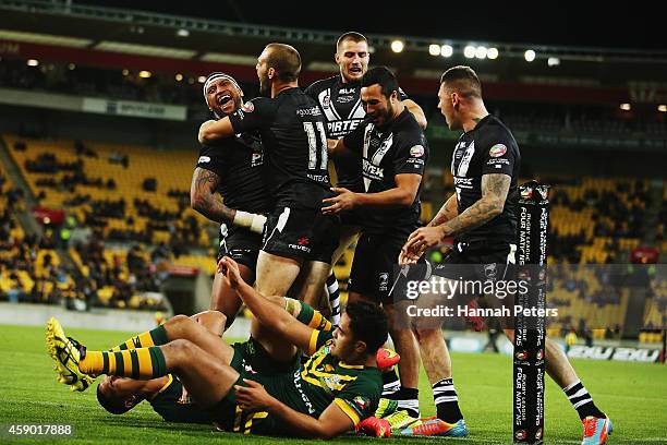 Manu Vatuvei of New Zealand celebrates after scoring a try during the Four Nations Final between the New Zealand Kiwis and the Australian Kangaroos...