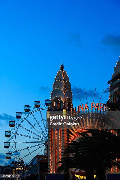 luna park at dusk, sydney, australia - luna park sydney stockfoto's en -beelden