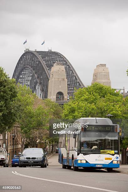 sydney harbour bridge and bus - sydney buses stock pictures, royalty-free photos & images