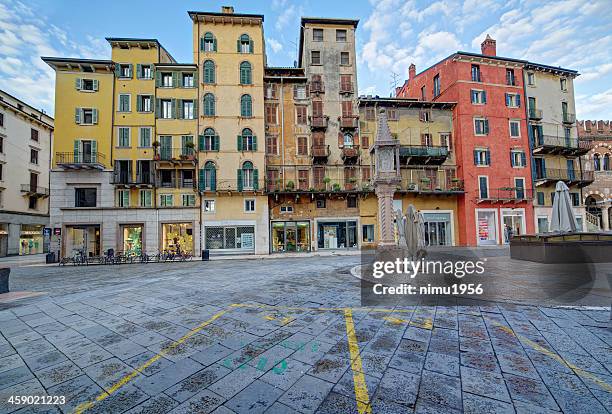 piazza erbe at twilight. verona-italy - verona italy stock pictures, royalty-free photos & images