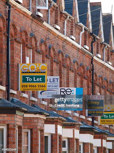 estate agent signs on old house - house rental stock pictures, royalty-free photos & images