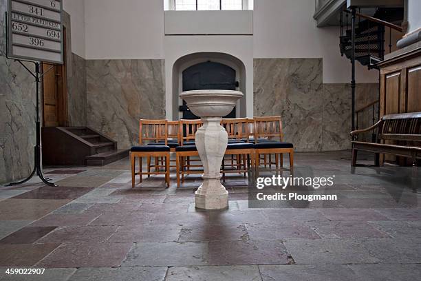 baptistery in trinitatis church, copenhagen, denmark - koepel stockfoto's en -beelden