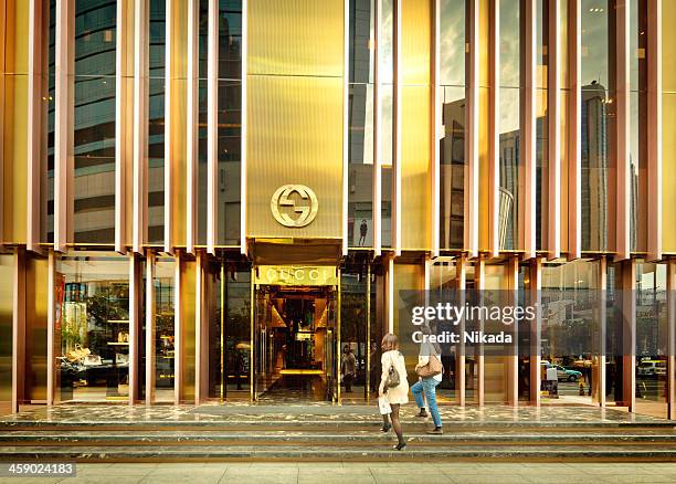 gucci flagship store in  shanghai china - gucci flagship stock pictures, royalty-free photos & images