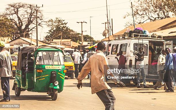 streets of west african town. - banjul stock pictures, royalty-free photos & images