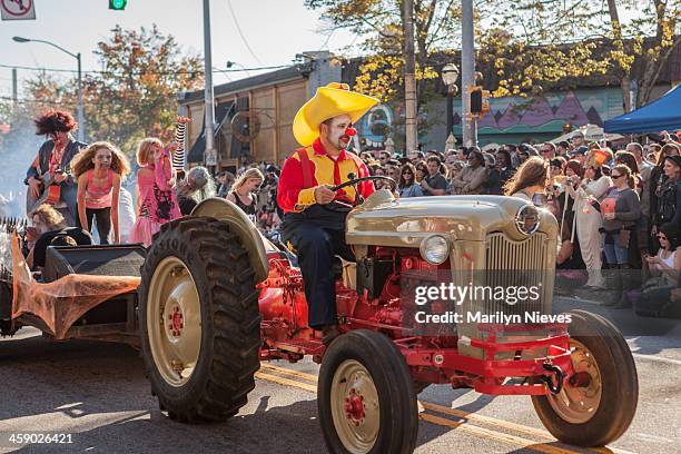 clowning around at the halloween parade - america parade stock pictures, royalty-free photos & images