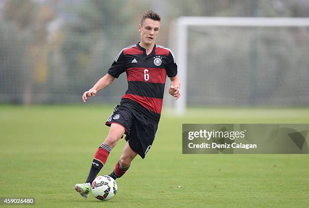 Gino Fechner of Germany handles the ball during the international friendly match between U18 Germany and U18 Czech Republic on November 15, 2014 in...