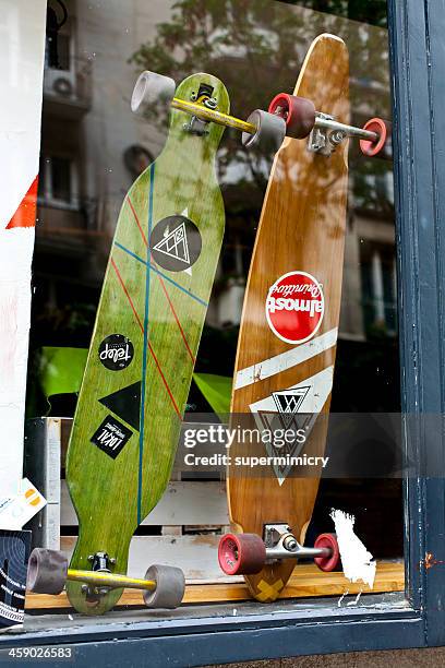 longboards - skateboard shop stock pictures, royalty-free photos & images