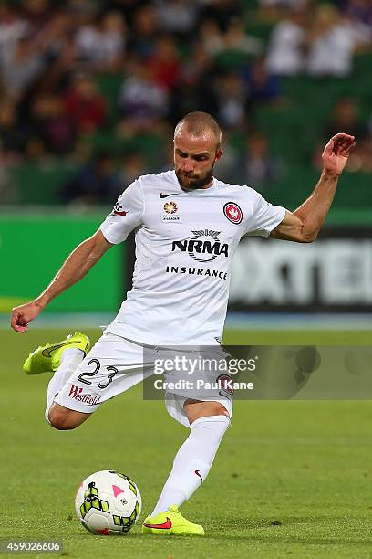 Jason Trifiro of the Wanderers passes the ball during the round six A-League match between the Perth Glory and Western Sydney Wanderers at nib...