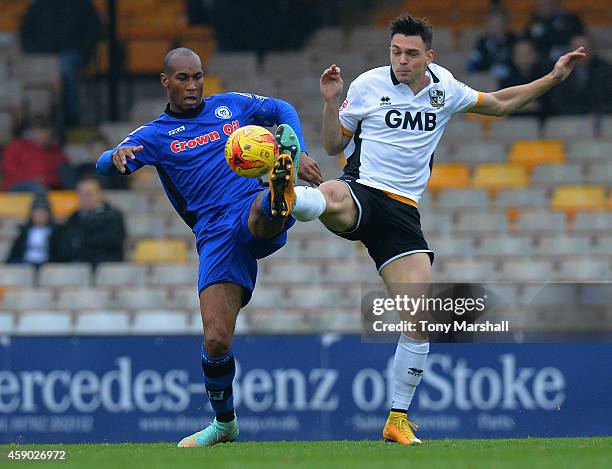 Frederic Veseli of Port Vale tackles Calvin Andrew of Rochdale during the Sky Bet League One match between Port Vale and Rochdale at Vale Park on...