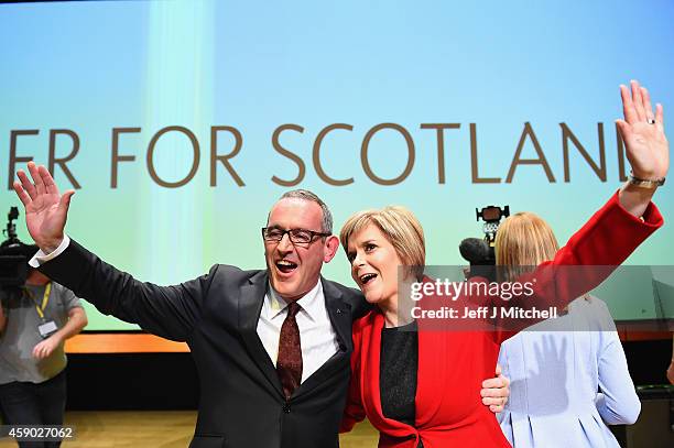 Nicola Sturgeon, and deputy Stewart Hosie acknowledge applause following her first key note speech as SNP party leader at the party's annual...