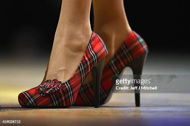 Nicola Sturgeon, wears tartan shoes as she delivers her first key note speech as SNP party leader at the party's annual conference on November 15,...