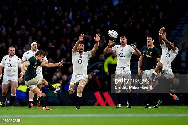 Pat Lambie of South Africa kicks a drop goal during the QBE Intenational match between England and South Africa at Twickenham Stadium on November 15,...