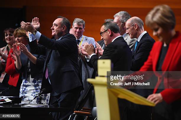 Former SNP leader Alex Salmond is given a standing ovation as Nicola Sturgeon, gives her first key note speech as SNP party leader at the partys...