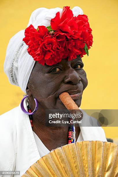 cuban woman with cigar - cuban ethnicity stock pictures, royalty-free photos & images