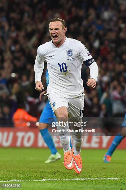 Wayne Rooney of England celebrates as he scores their first and equalising goal from a penalty during the EURO 2016 Qualifier Group E match between...