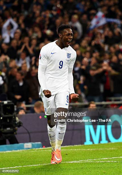 Danny Welbeck of England celebrates after scoring his team's third goal during the EURO 2016 Group E Qualifier match between England and Slovenia at...