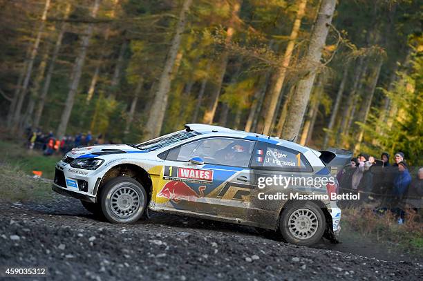 Sebastien Ogier of France and Julien Ingrassia of France compete in their Volkswagen Motorsport Volkswagen Polo R WRC during Day Two of the WRC Great...