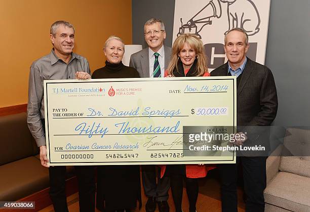 Of Ketchum Sports and Entertainment/T.J. Martell Foundation VP Marcus Peterzell, Susan Corson, Dr. David Spriggs, T.J. Martell Foundation CEO Laura...