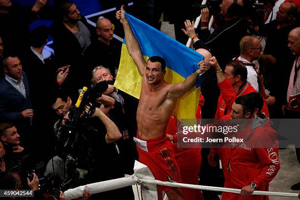 Wladimir Klitschko of Ukraine celebrates after winning the IBF, WBA, WBO and IBO World Championship fight between Wladimir Klitschko and his...