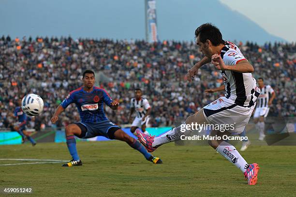 Cesar 'Chelito' Delgado of Monterrey kicks the ball during a match between Monterrey and Chivas as part of 8th round Apertura 2014 Liga MX at...