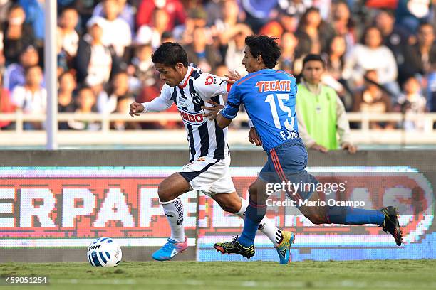 Severo Meza of Monterrey fights for the ball with Fernando Arce of Chivas during a match between Monterrey and Chivas as part of 8th round Apertura...