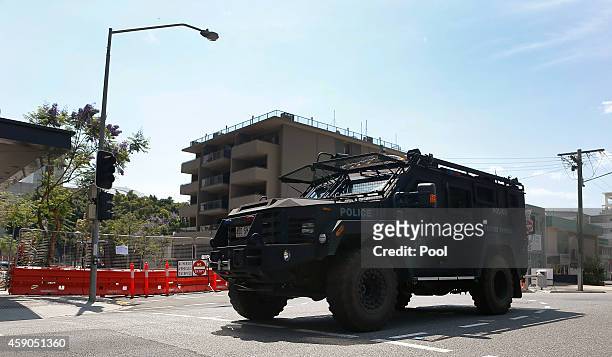 An armored police vehicle patrols near the Brisbane Convention and Exhibition Centre on November 16, 2014 in Brisbane, Australia. World leaders have...
