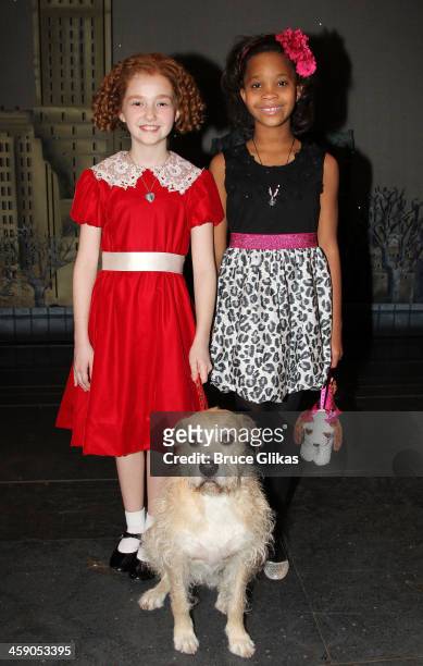 Taylor Richardson as "Annie" and Quvenzhané Wallis pose with "Sandy" backstage at "Annie" on Broadway at The Palace Theater on December 22, 2013 in...