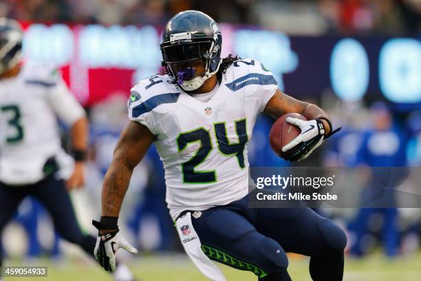 Marshawn Lynch of the Seattle Seahawks in action against the New York Giants at MetLife Stadium on December 15, 2013 in East Rutherford, New Jersey....