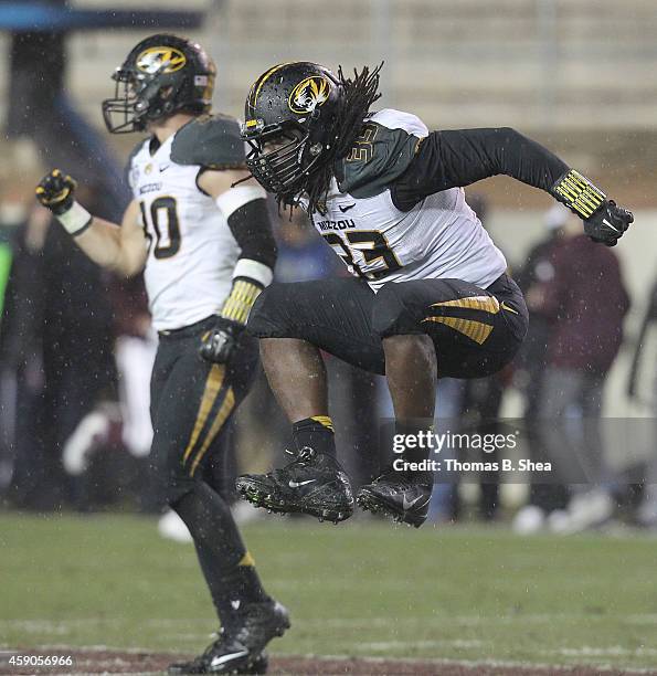 Markus Golden of the Missouri Tigers celebrates sacking the Texas A&M Aggies quarterback in the first half of an NCAA football game on November 15,...