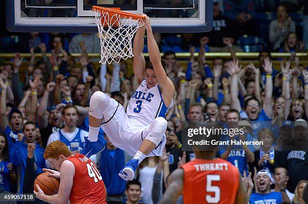 Grayson Allen of the Duke Blue Devils dunks over Kevin Degnan of the Fairfield Stags during their game at Cameron Indoor Stadium on November 15, 2014...