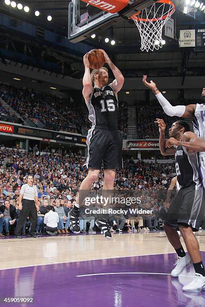 Matt Bonner of the San Antonio Spurs grabs the rebound against the Sacramento Kings during the game on November 15, 2014 at Sleep Train Arena in...