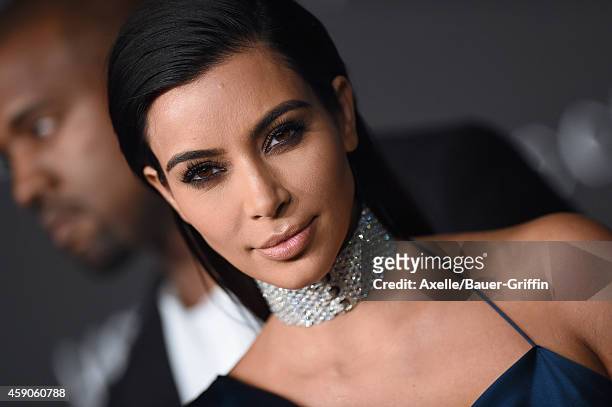 Personality Kim Kardashian and singer Kanye West attend the 2014 LACMA Art + Film Gala Honoring Barbara Kruger And Quentin Tarantino Presented By...