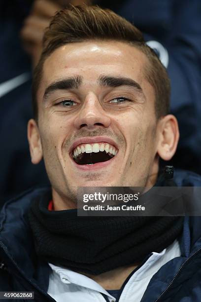 Antoine Griezmann of France looks on from the bench during the international friendly match between France and Albania at Stade de la Route de...