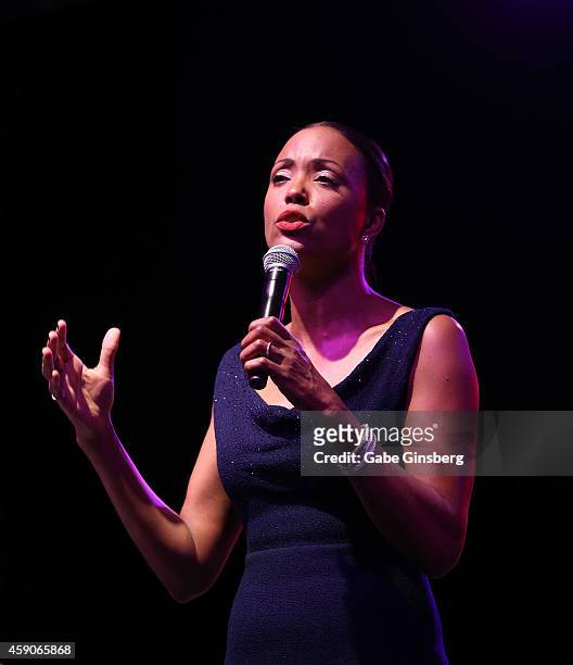 Actress Aisha Tyler speaks on stage at Live Your Passion Celebrity Benefit at The Venetian Las Vegas on November 15, 2014 in Las Vegas, Nevada.
