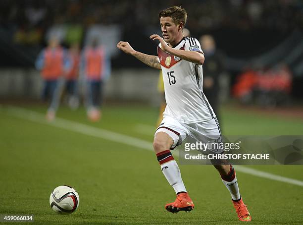 Germany's defender Erik Durm plays the ball during the UEFA 2016 European Championship qualifying round Group D football match Germany vs Gibraltar...