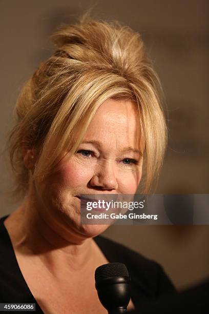 Actress/comedian Caroline Rhea speaks to an interviewer as she arrives at Live Your Passion Celebrity Benefit at The Venetian Las Vegas on November...