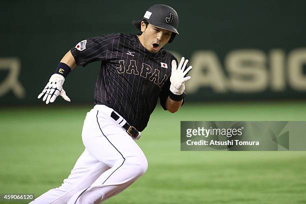 Nobuhiro Matsuda of Samurai Japan runs home to score in the second inning during the game four of Samurai Japan and MLB All Stars at Tokyo Dome on...