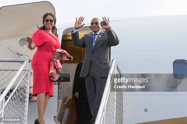 In this handout photo provided by the G20 Australia, South Africa's Prime Minister Jacob Zuma waves before departing Brisbane after the the G20...
