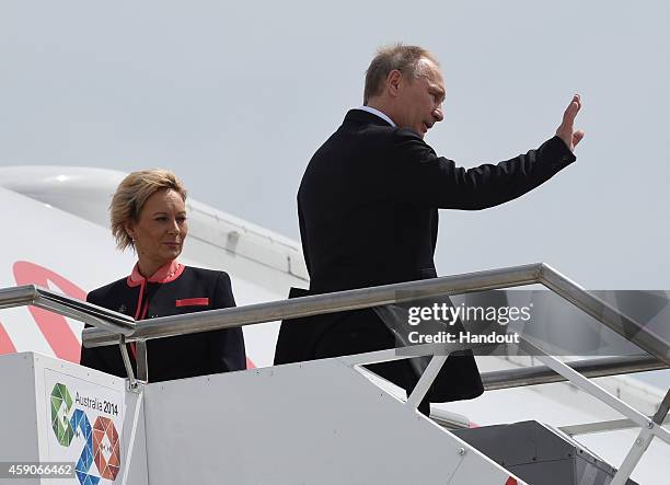 In this handout photo provided by the G20 Australia, Russias President Vladimir Putin departs Brisbane Airport after the the G20 Leaders Summit on...