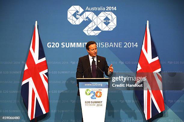 In this handout photo provided by the G20 Australia, United Kingdom's Prime Minister David Cameron addresses the media at a press conference at the...