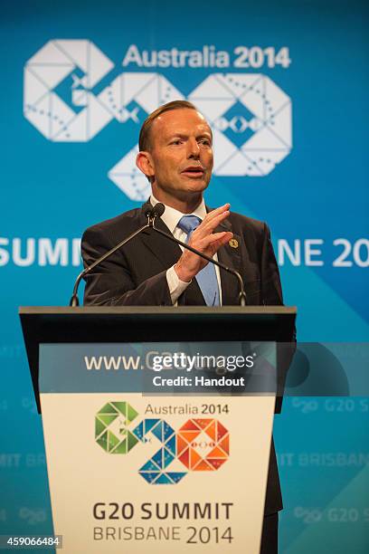 In this handout photo provided by the G20 Australia, Australian Prime Minister Tony Abbott addresses the media at a press conference at the...