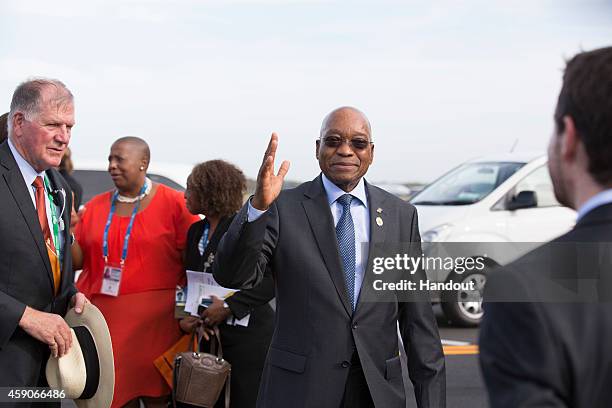 In this handout photo provided by the G20 Australia, South Africa's Prime Minister Jacob Zuma waves before departing Brisbane after the the G20...