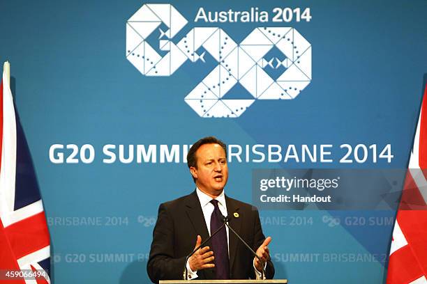 In this handout photo provided by the G20 Australia, United Kingdom's Prime Minister David Cameron addresses the media at a press conference at the...