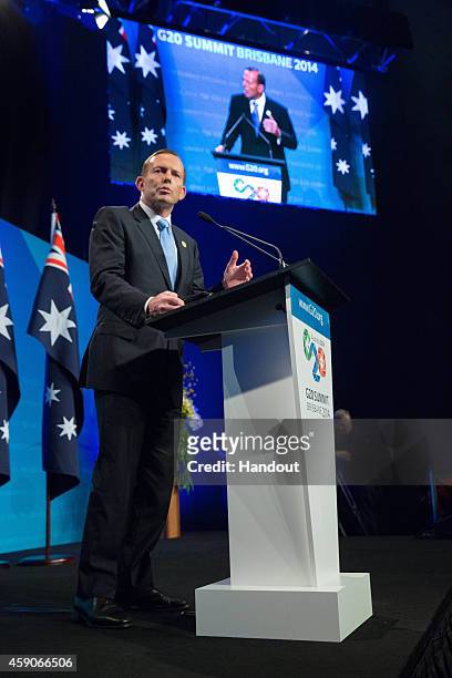 In this handout photo provided by the G20 Australia, Australian Prime Minister Tony Abbott addresses the media at a press conference at the...