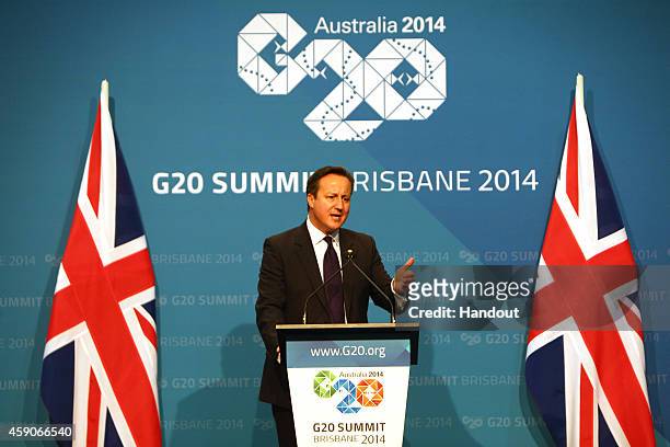 In this handout photo provided by the G20 Australia, United Kingdom's Prime Minister David Cameron addresses the media at a press conference at the...